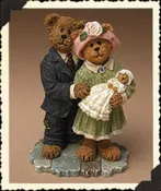 Boyds Stone Resin Mom and Dad with Baby Figurine
