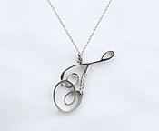 CALLIGRAHIC 'T' INITIAL DIAMOND PENDANT — VIVAAN