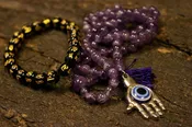 Amethyst Mala beads Evil Eye pendant Om Mani Padme Hum Bracelet