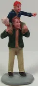 Dad carrying little boy with cotton candy 2-5/8 in. train figure