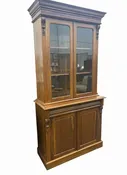 2-pc. 19th-century Victorian mahogany bookcase w/ glass-paneled doors over cabin