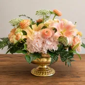 Regal Centerpiece: Peach Lilies in Gold Bowl