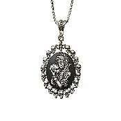 Antiqued White Voodoo Mistress Holding a Sugar Skull Cameo in Skull Frame Pendant
