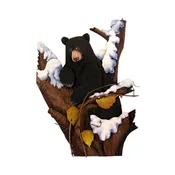 Bear In A Snowy Tree