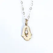 14k Gold Tiny Hamsa Amulet by Emily Rosenfeld