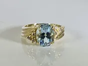 10KT Yellow Gold Oval Blue Topaz with Diamond accents Size 6.5