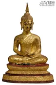 A Brass Seated Buddha Figure