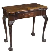 A Carved Mahogany Chippendale Game or Card Table, England, c.1780