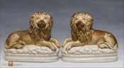 A Pair of Antique English Staffordshire Recumbent Lions, c1890-1900