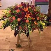 Abundant Rustic Love Casket Flowers
