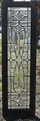 Antique all beveled glass sidelight with wheel cut center design.