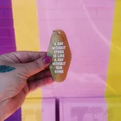 A Day Without Dykes Motel Keytag