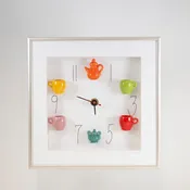 10x10 Clock with a Orange Teapot and Teal Sugar Jar in a Silver Frame