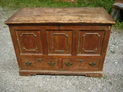 18th century pine country blanket chest paneled front and sides over two drawers; bracket base.