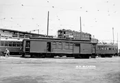 Pacific Electric Combination Car 1401 on surface tracks at 6th and Main Street  – 1930s