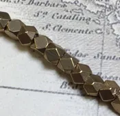 3mm Faceted Indonesian Spacer – Brass