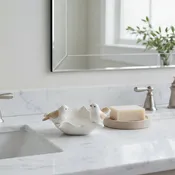 Ceramic bowl with leaves and 2 birds on edge. Soap dish