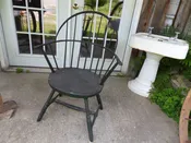18th century bow back Windsor arm chair in original dark green crusty paint