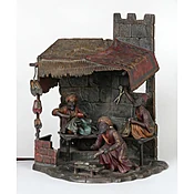 A Cold Painted Austrian bronze Lamp of a Cobbler Shop