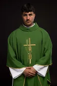 Green chasuble with cross and alfa omega symbols