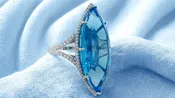 Blue Topaz Marquise and Diamond Ring