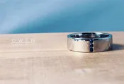 CUSTOM HAMMERED WHITE GOLD RING WITH BLUE SAPPHIRE — Owen Jewelry Design