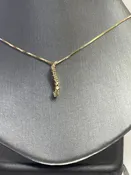 10 Karat Yellow Gold Diamond Journey Pendant Graduated Size Brilliant Diamonds
