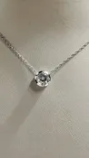 0.95ct clear star brilliant cut Texas topaz is set in a sterling silver slide pendant and chain