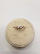 10kt white and rose gold featuring an infinity symbol with diamonds