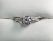 14K WHITE GOLD DIAMOND SOLITAIRE WITH DIAMOND ACCENTS