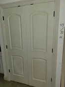 H2- Primed 2-Panel Arch Top Prehung Interior Double Door, 48 x 80, Hollow Core