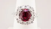 18k GRS certified Pigeon's blood ruby and natural diamond halo style ring