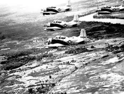 Framed Art A-1 Skyraider Formation Over South Vietnam, 1965 by McMahan Photo Archive 8 x 10