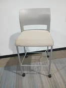 Steel Case Stacking chair with wheels. White and cream color. 100% Polyurethane foam pad
