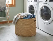 100% Handwoven Natural Rattan Approximately 21-24" Oval Basket with Handles, Boho Farmhouse Decorative Laundry & Storage Organizer, Handcrafted – Authentic African Craftsmanship
