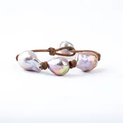 3 Pink Baroque Pearls knotted on Tan Leather Cord. Pearl Button Closure
