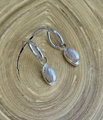 R10 Reversible Earrings — Lilly Barrack  Seasoned artist, Lilly Barrack, has been designing hand-made sterling silver gemstone jewelry for more than three decades. The Lilly Barrack’s three store locations (two in Albuquerque, NM, and one in Scottsdale, AZ.) carry exclusive gift items and designs from upwards of 60 unique artists.