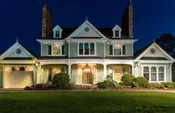 FRONT FACADE — LAND BY DESIGN