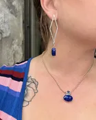 N47 Lapis & Kyanite Necklace — Lilly Barrack  Seasoned artist, Lilly Barrack, has been designing hand-made sterling silver gemstone jewelry for more than three decades. The Lilly Barrack’s three store locations (two in Albuquerque, NM, and one in Scottsdale, AZ.) carry exclusive gift items and designs from upwards of 60 unique artists.
