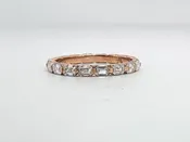 14K, Rose gold, .68 diamond total weight, emerald cut diamond band.