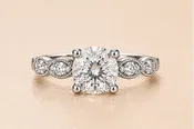 Cushion-Cut Diamond Ring with Oval Side Accents