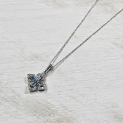 10k White Gold .15ct Blue Topaz and Diamond Pendant