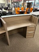 CDN ARCED RECEPTION DESK W/GLASS COUNTER