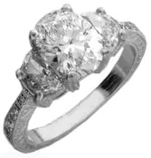 1 1/2ct Oval Cut center Diamond with Side Diamonds