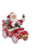 8.5" Fabriché™ Musical Santa In Candy Car