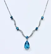 Blue Topaz Drop Necklace in 14k White Gold