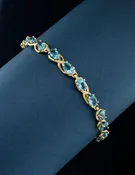 10k Yellow Gold Blue Topaz Bracelet