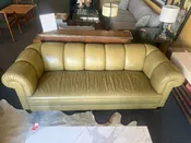 Baker Tufted Leather Sofa on Casters Elegant & Timeless