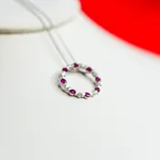 14kt White Gold Diamond and Ruby Round Style Necklace with 18” 14kt White Gold Chain.
