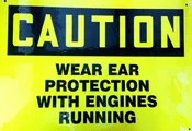 10" x 14" Sign (Wear Ear Protection with Engines...)